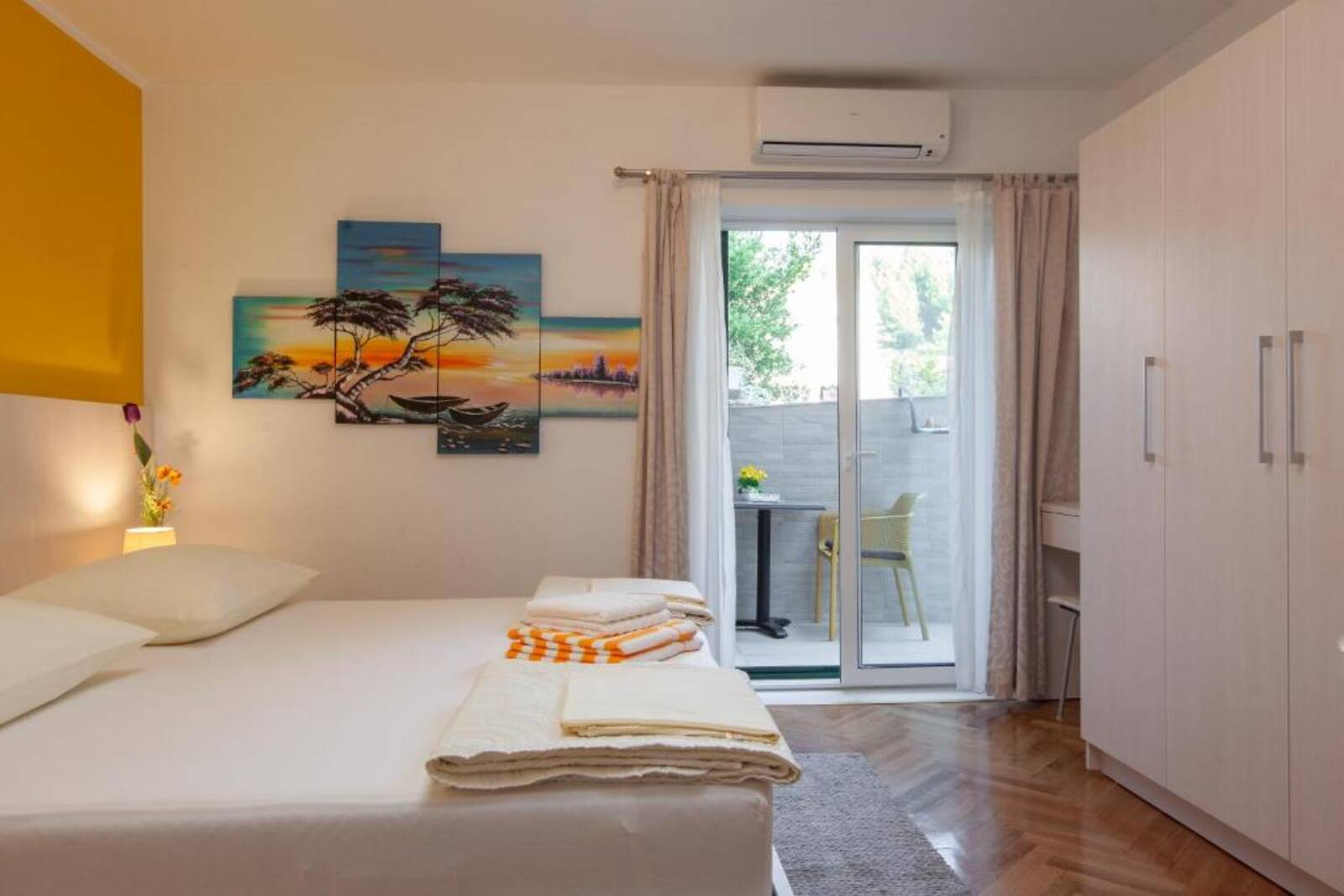 Bright room with balcony and wardrobe